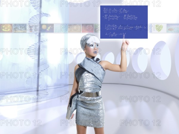 Futuristic children girl in silver touch finger math formula on glass screen