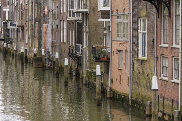 Detailed image of the facades of houses along a canal, Dordrecht, holland, netherlands