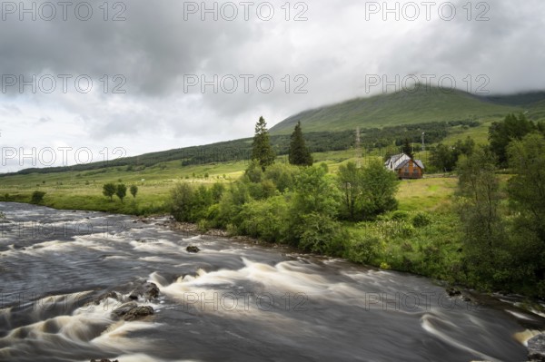 The bridge of orchy river in Argyll and Bute in the central highlands of Scotland, United Kingdom. Longexposure photography