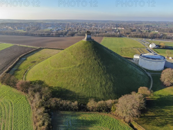 Aerial view of The Lion's Mound with farm land around. The immense Butte Du Lion on the battlefield of Waterloo where Napoleon died. Belgium