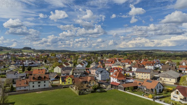 Town view with bright roofs and landscape under a cloudy, blue sky, Mitterteich, Upper Palatinate, Bavaria, Germany, Europe