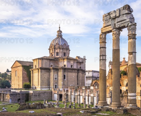 ROME, ITALY, CIRCA AUGUST 2020: sunrise light with blue sky on Roman ancient architecture