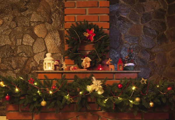 Christmas wreath and garland on the fireplace