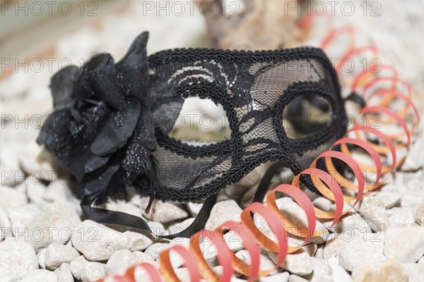Black half mask for carnival - close-up erotic eye mask