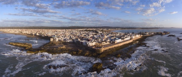 Aerial panorama of medieval Essaouira old city on Atlantic coast at sunset, Morocco, Africa