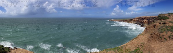 Panorama of ocean waves and rocks on the Atlantic coast in Morocco
