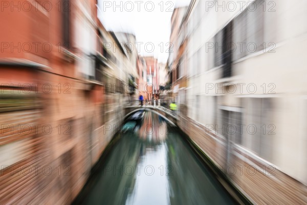 Bridge over a canal, zoom effect, Venice, Italy, Europe