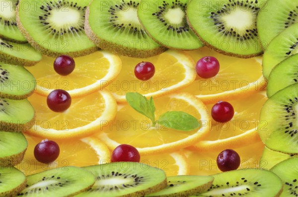 Background From Sliced Fruits, Red Bilberry And Mint Daugavpils, Latvia, Europe