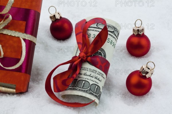 Dollar banknotes with ribbon as a gift of money, Austria, Europe