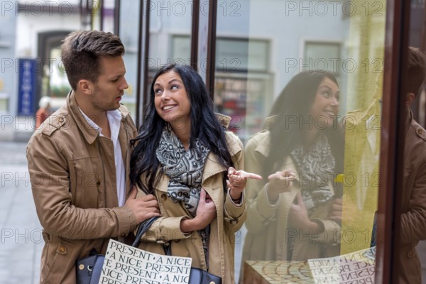 Young couple shopping. Shopping in the city is fun in Austria