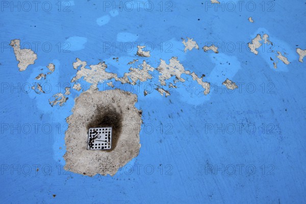 The drain of an old swimming pool