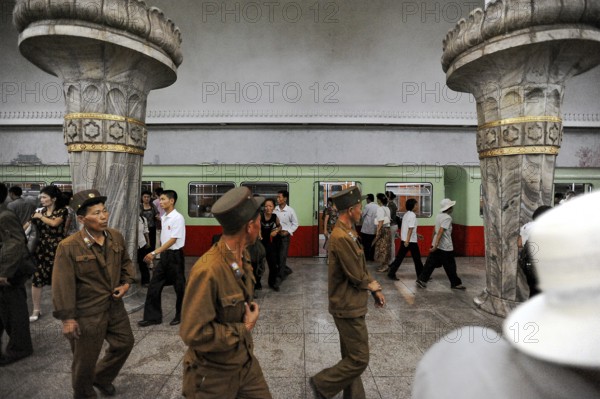 09.08.2012, Pyongyang, North Korea, Asia, People leaving an underground train on the platform of a station in the capital city, Asia