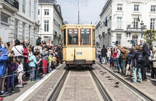 Brussels Old Town, Brussels Capital Region, Belgium, 05 01 2019, People cheering the old yellow tramway durign the celebration of the 150 year streetcars, Europe