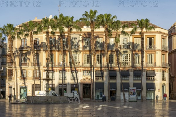 Malaga, Spain, April 2016: view on the Plaza de la Constitución, looking at the Avalunion building, Europe