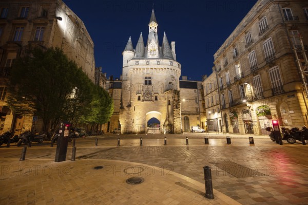 Night view of the Porte Cailhau or Porte du Palais. The former town gate of the city of Bordeaux in France. One of the main touristic attractions of the French city. High quality photography