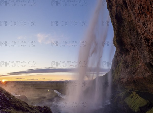 Sunset at Seljalandsfoss waterfall, South Iceland, Iceland, Europe