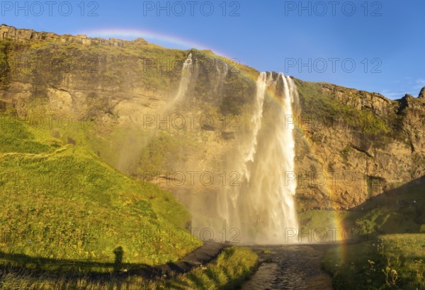 Rainbow at Seljalandsfoss waterfall, South Iceland, Iceland, Europe