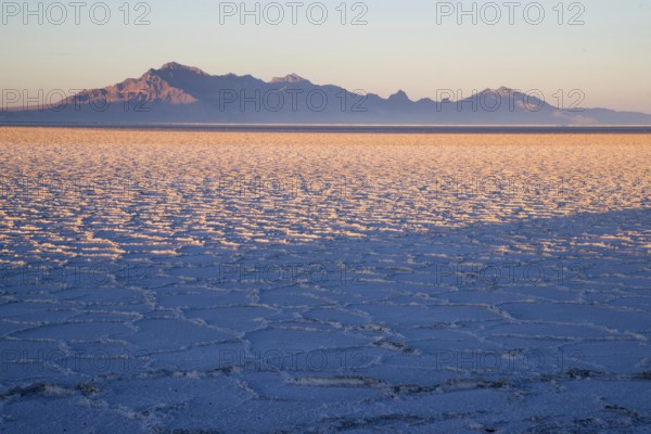Long shadows fall on the Salt Flats near West Wendover Nevada on the border with Utah
