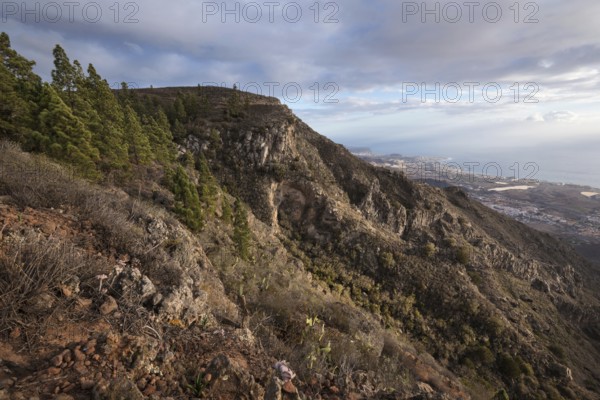 Tenerife mountain landscape. Trekking path. Adeje and Las Americas coastline in the background