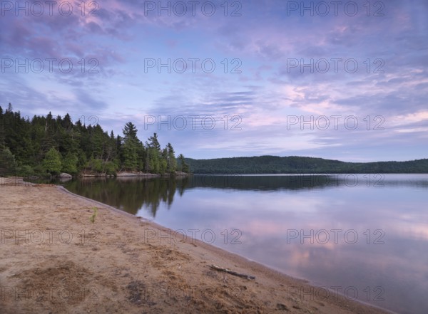 Algonquin Provincial Park summertime nature scenery of the Lake of Two Rivers at sunset. Ontario, Canada, North America