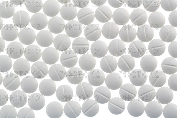 White tablets, symbolic photo for medicine, remedies and tablet addiction Austria