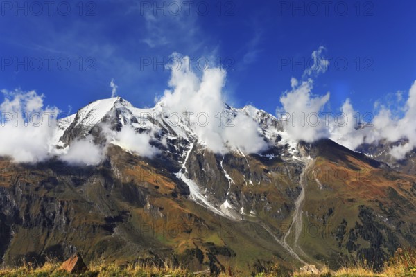 Snow-capped Alps in beautiful autumn day