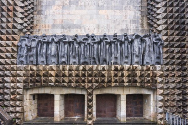 Sculptures of the 14 apostles on the façade, sculptor Jorge Oteiza, and iron doors by Eduardo Chillida, Arantzazu Sanctuary, municipality of Oñati, Basque Country, Spain, Europe