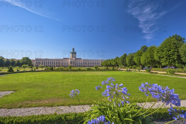 Berlin, Germany, July 19, 2022 : back side at Charlottenburg Palace (Schloss) the Baroque summer palace with garden, Europe