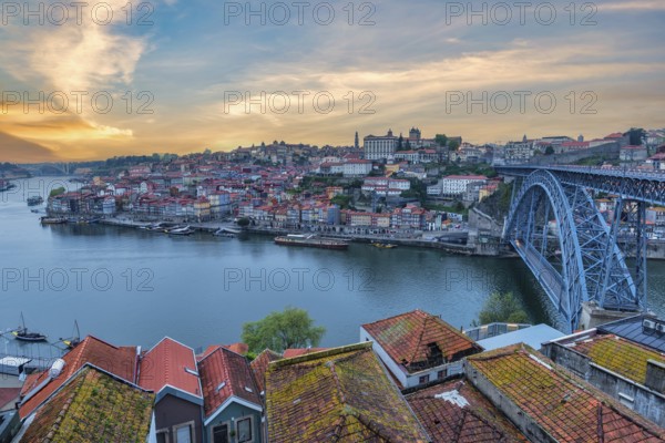 Porto Portugal, sunrise city skyline at Porto Ribeira with Douro River and Dom Luis I Bridge