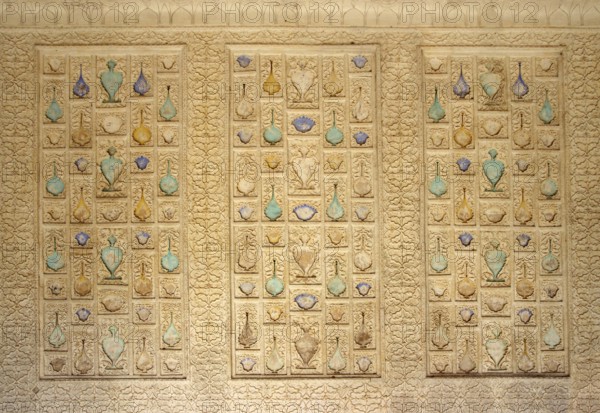 Ornament on wall of palace in Jaipur fort India