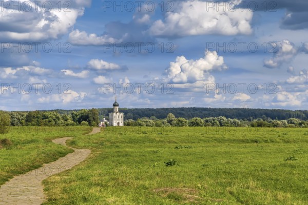 The Church of the Intercession of the Holy Virgin on the Nerl River is an Orthodox church and a symbol of medieval Russia. View from the field