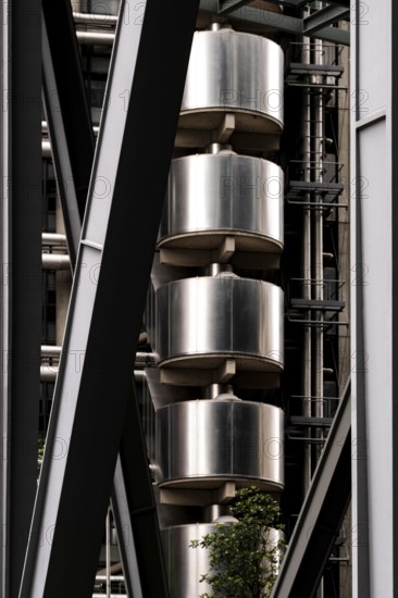 Close-up of an industrial-style building featuring metal structures and vertical elements, London, UK