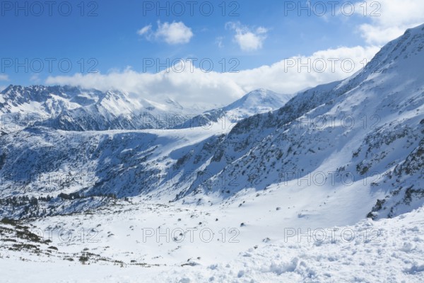 Tops of Pirin mountains view from top of cable car, Bansko. Bulgaria.