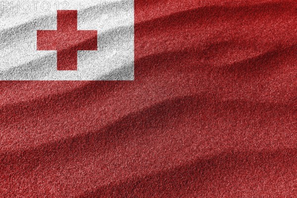 Tonga sand flag, national flag sand background