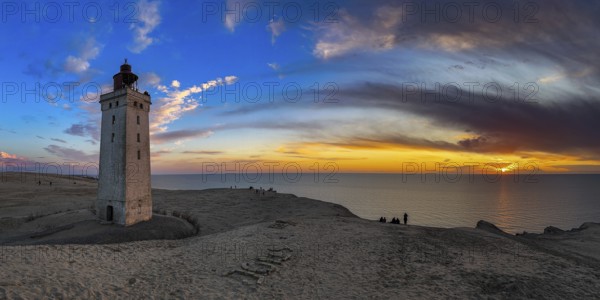The Rubjerg Knude Fyr lighthouse near Lokken in Denmark in the light of sunset