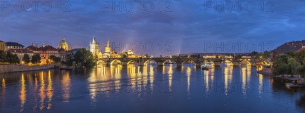Prague Czechia Czech Republic, panorama night city skyline at Charles Bridge and Prague old town