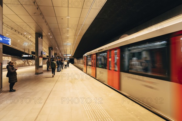 Amsterdam, Netherlands, May 5, 2022: Underground station in central Amsterdam. Train entering the station. Motion blur