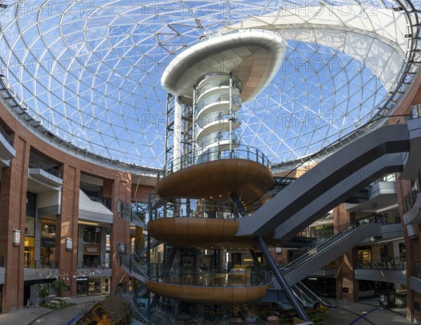 Belfast, United Kingdom, 21 August, 2022: the glass dome and elevator tower inside the Victoria Square shopping complex in downtown Belfast, Europe
