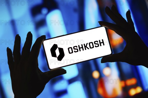 In this photo illustration, the Oshkosh Corporation logo is displayed on a smartphone screen