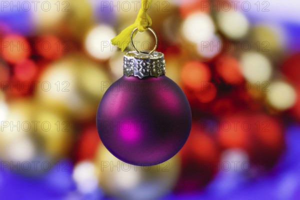 Closeup of an hanging purple christmas ornament