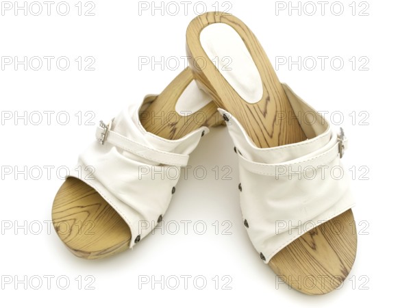 Woman summer white shoes over white background