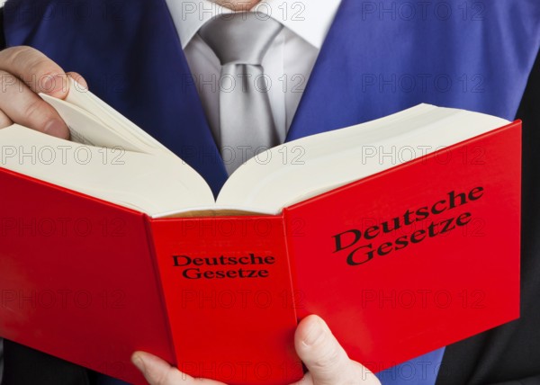 A judge with a German code in court. Austria