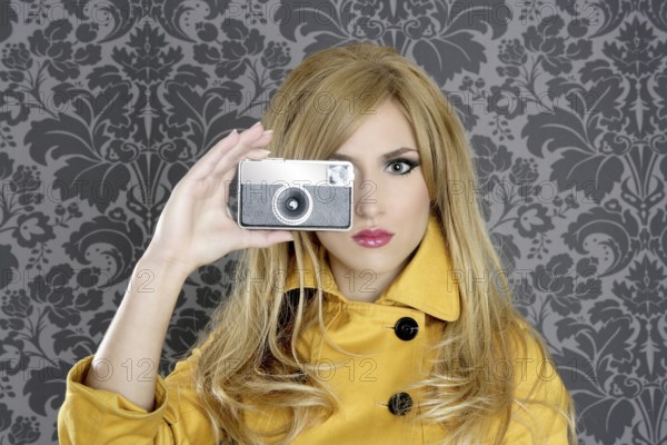 Fashion photographer retro camera reporter woman vintage wallpaper yellow coat