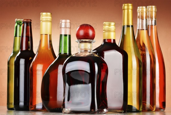 Bottles of assorted alcoholic beverages including beer and wine