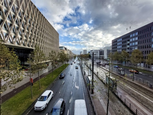 Antwerp, Belgium, November 5th 2023: View on easy traffic on Italielei in Antwerp and surrounding buildings at Noorderplaats, Europe