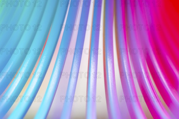 Details of a rainbow coloured plastic toy