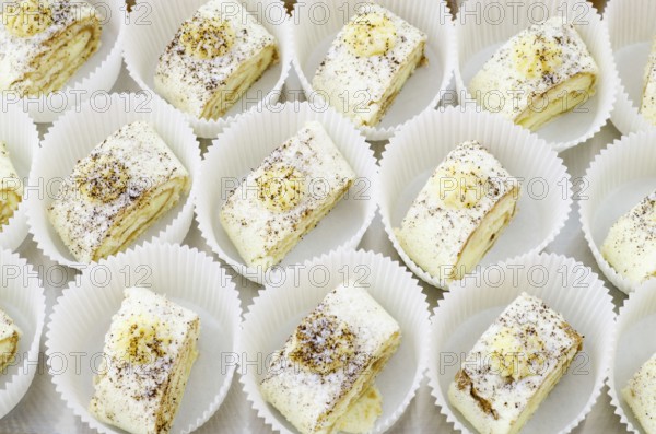 A lot of Swiss rolls on buffet table, catering