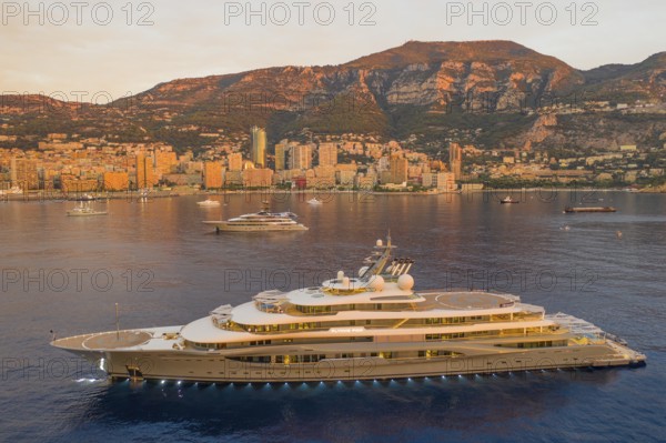 Aerial view of 136 metre superyacht Flying Fox, delivered in 2019 by the Bremen shipyard Lürssen Yachts for the Russian oligarch Dmitry Kamenshik, here at anchor off the Principality of Monaco, Mediterranean Sea