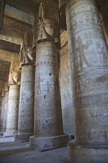 Interior of the painted and carved hypostyle hall at Dendera Temple. Ancient Egyptian temple near Qena