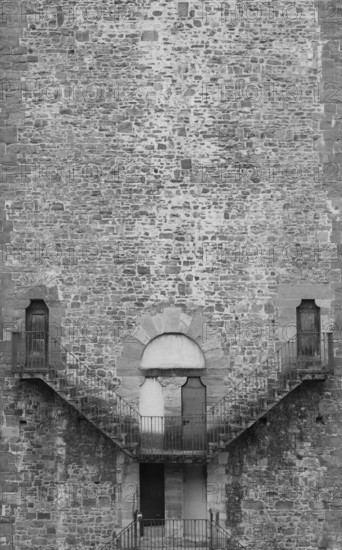 Exterior of antique building with Escher architecture style. Simmetry and geometric perspective